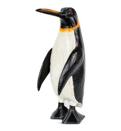 Hand carved wood penguin figurine with orange beak