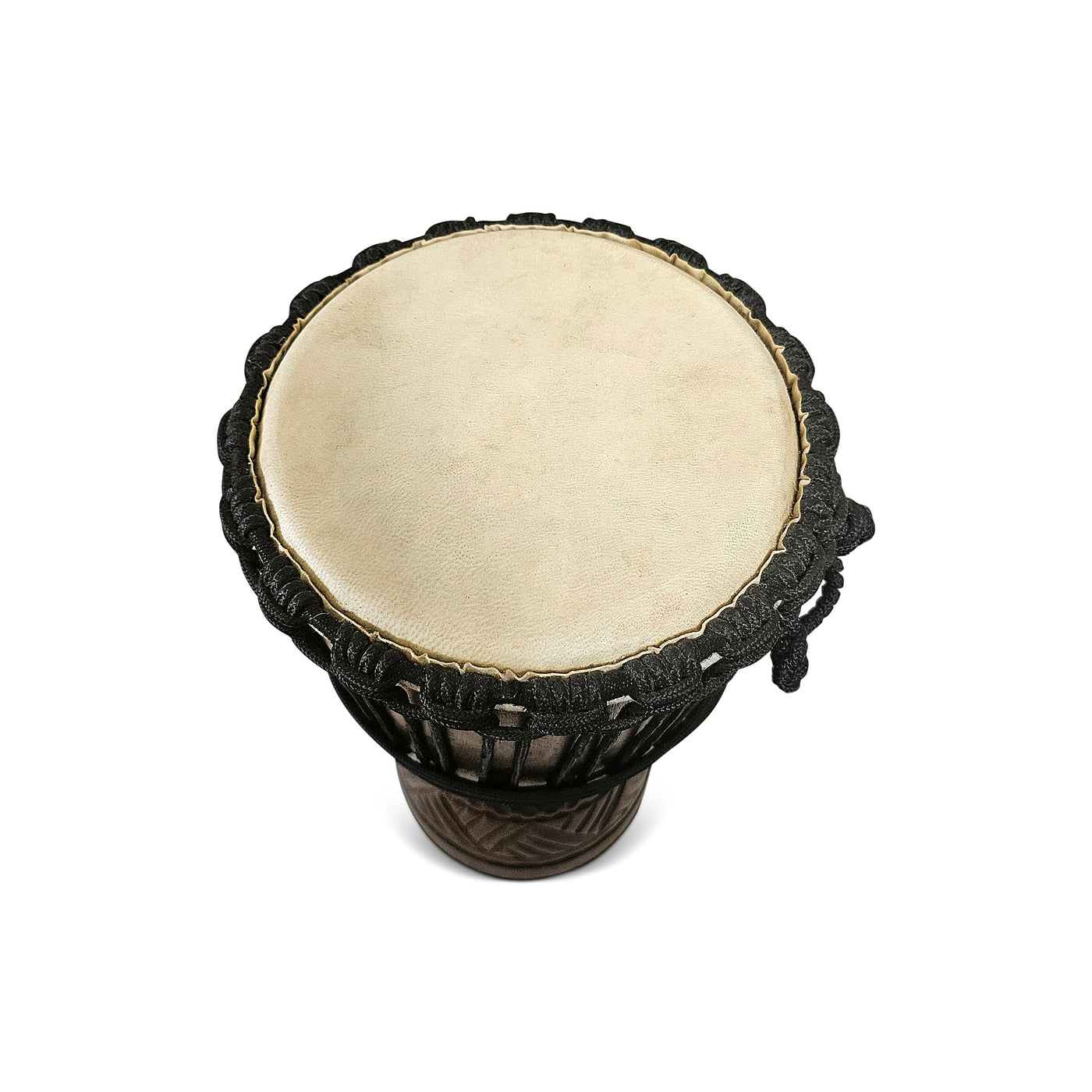 Traditional African drum with black rope wrapping on a white background