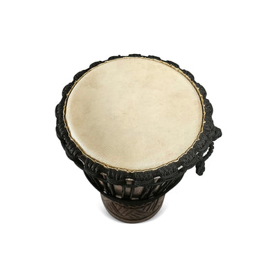 Traditional African drum with black rope wrapping on a white background
