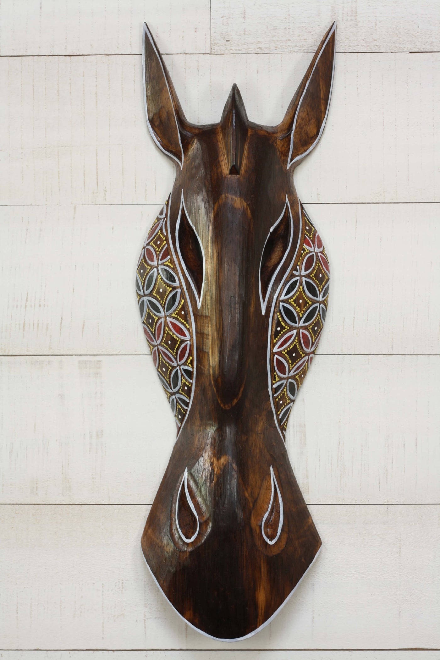 Hand carved wooden giraffe wall mask with hand-painted tribal dot pattern