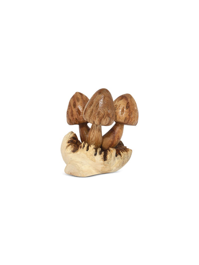 Wooden mushroom sculpture on a white background