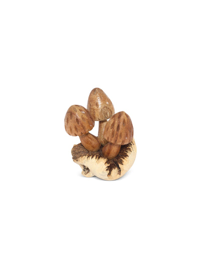 Wooden figurine of a hedgehog with acorns on a white background