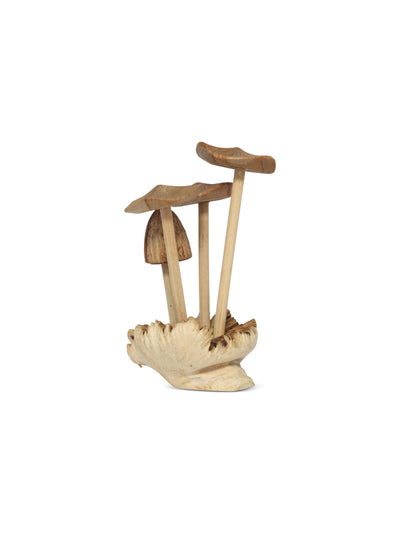Wooden shoe tree with a shell-shaped base on a white background