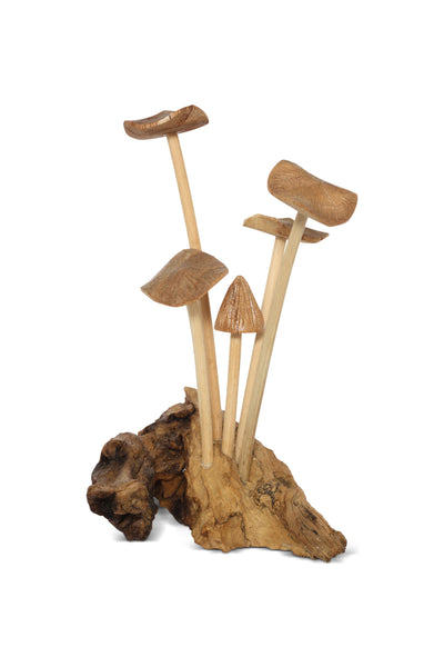 Wooden mushroom sculpture on a natural wood base against a white background