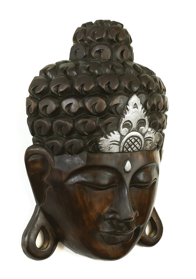 Bring tranquility to your home with this 12" hand carved wooden Buddha wall mask, black with silver crown. Perfect as spiritual décor, gift, or wall hanging.