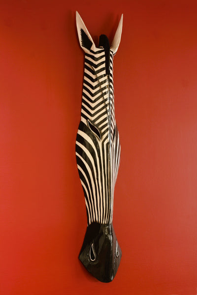 Zebra head wall decoration on a red background