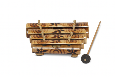 Traditional Indonesian bamboo xylophone Rindik with beater rustic décor
